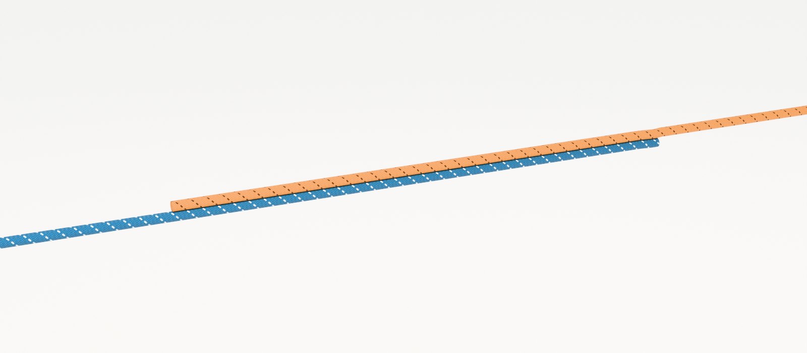 A steel-blue main line and an apricot leader laid side by side, their ends overlapping before the knot is tied